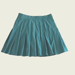- Le Coq Sportif Pleated Sport  Skirt